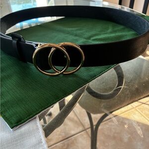 Black faux leather adjustable belt 47 inches long